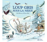 Loup gris sous la neige